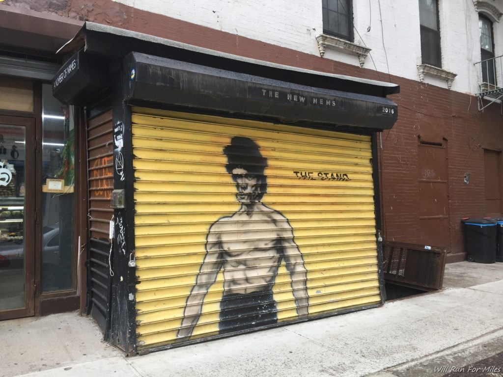 a painted garage door with a man on it