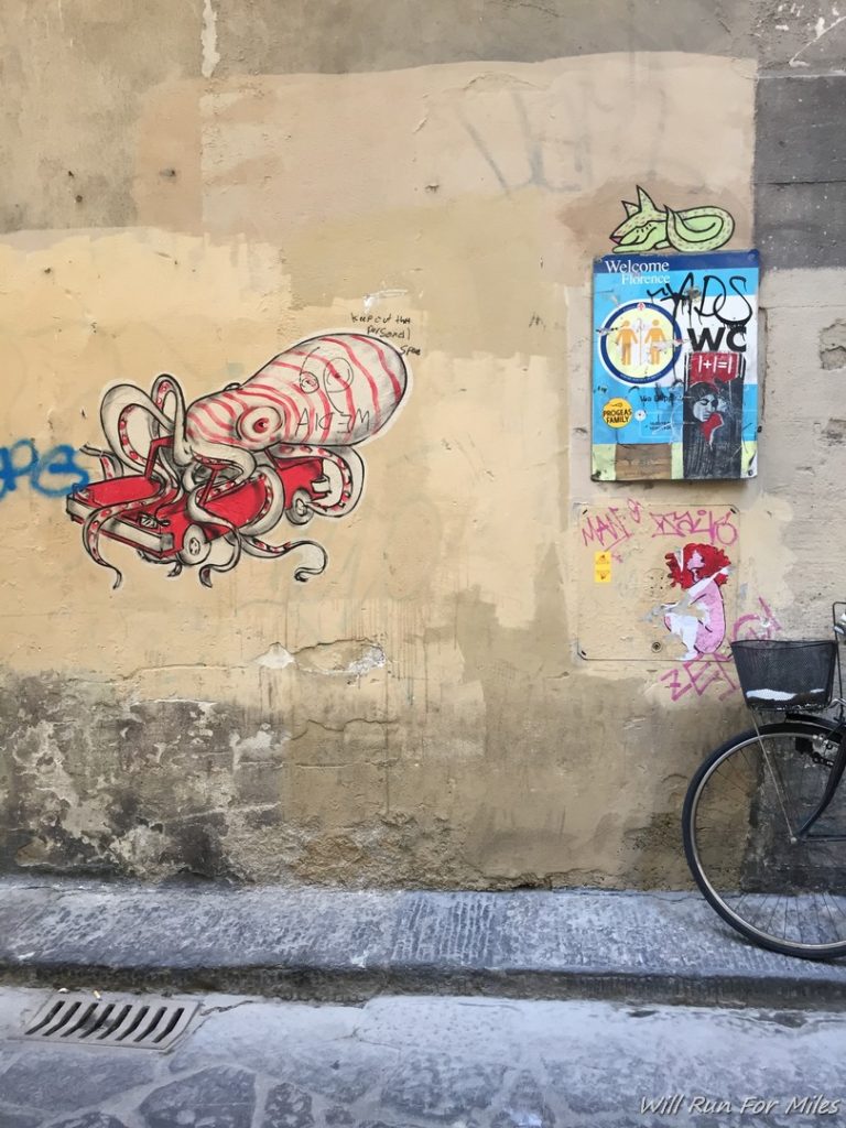 a bicycle parked on a wall