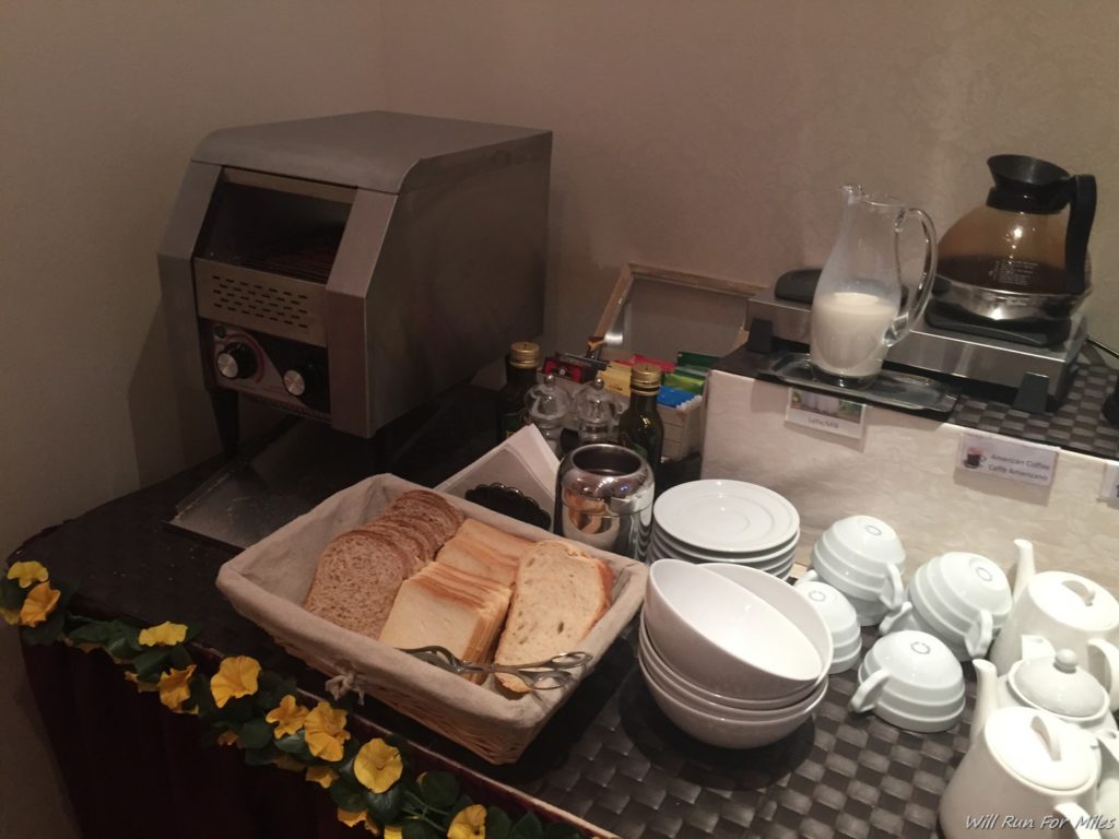 a bread and plates on a counter