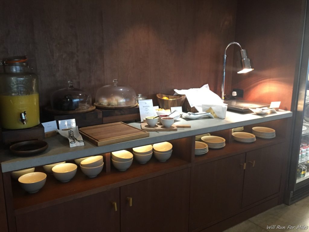 a counter with bowls and plates on it