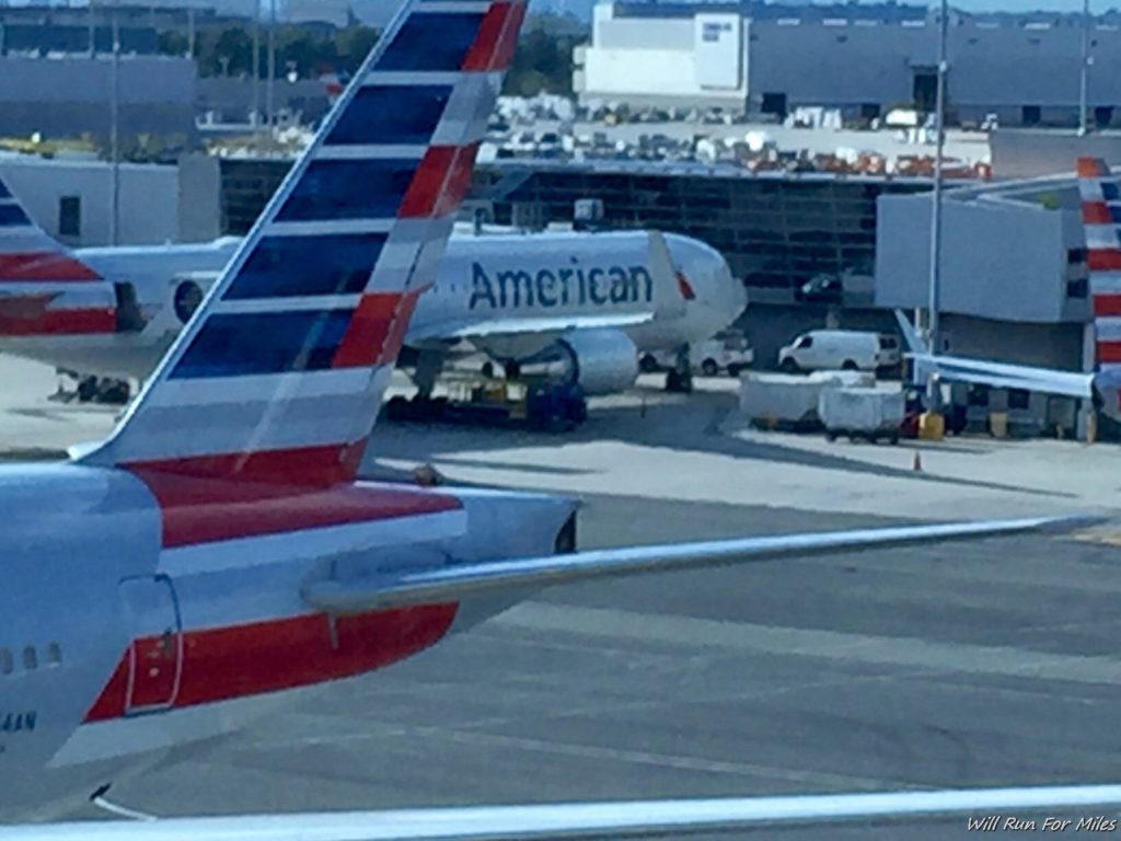 an airplane wing with red and white stripes