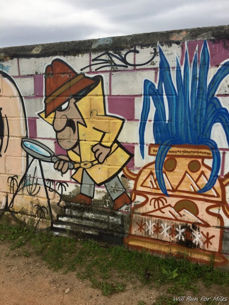a wall with graffiti on it