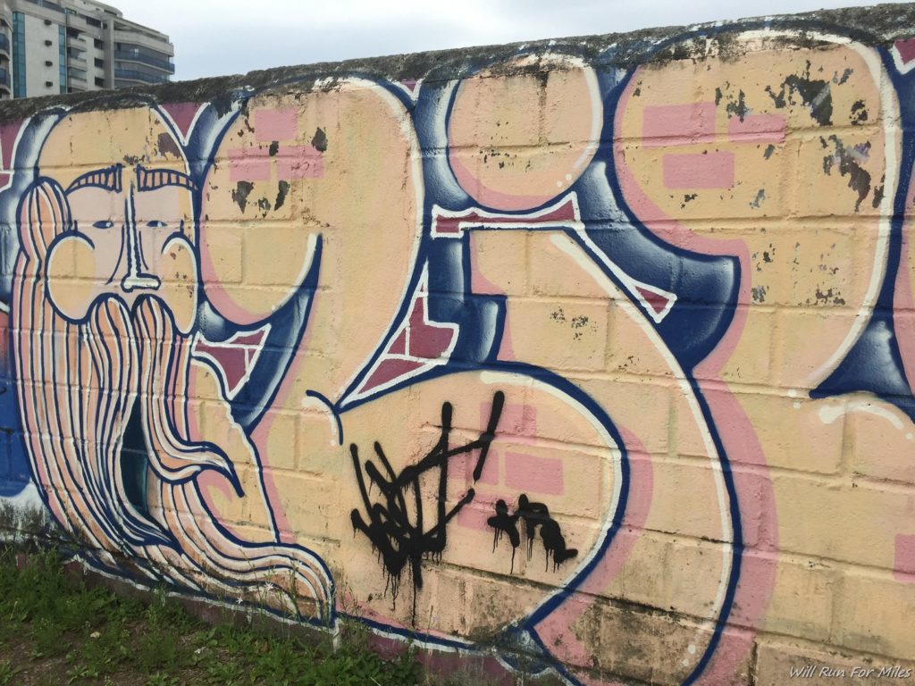 a wall with graffiti on it