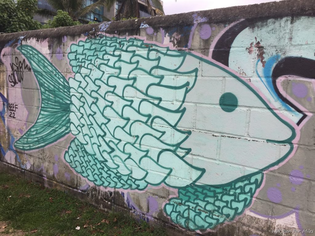 a wall with a fish painted on it