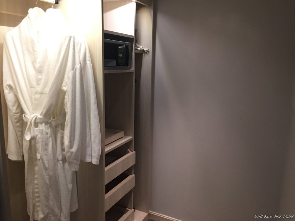 a white robe on a rack