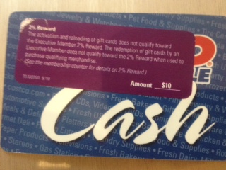 a blue gift card with white text and a purple card