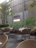 a table and chairs outside a building