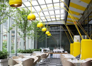 a restaurant with yellow lights