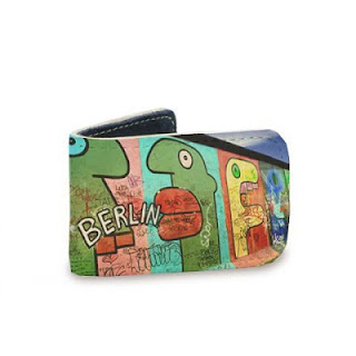 a wallet with graffiti on it