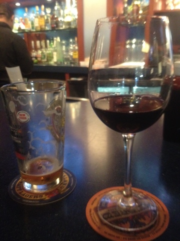 a glass of wine next to a glass of wine