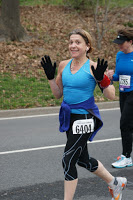 a woman running in a race