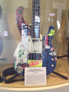 a guitar with stickers on it