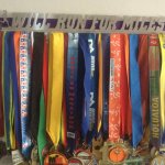 a group of medals on a wall