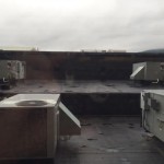 a group of air conditioning units on a roof