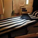 a black and white striped bed