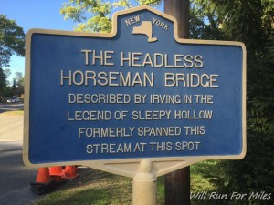 a blue sign with white text