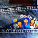 several credit cards in a pocket of jeans
