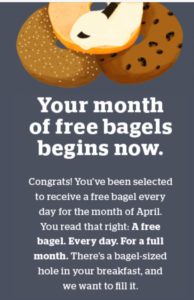 a bagel advertisement with a couple of bagels