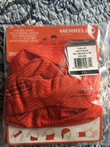 a red and white striped underwear in a plastic package