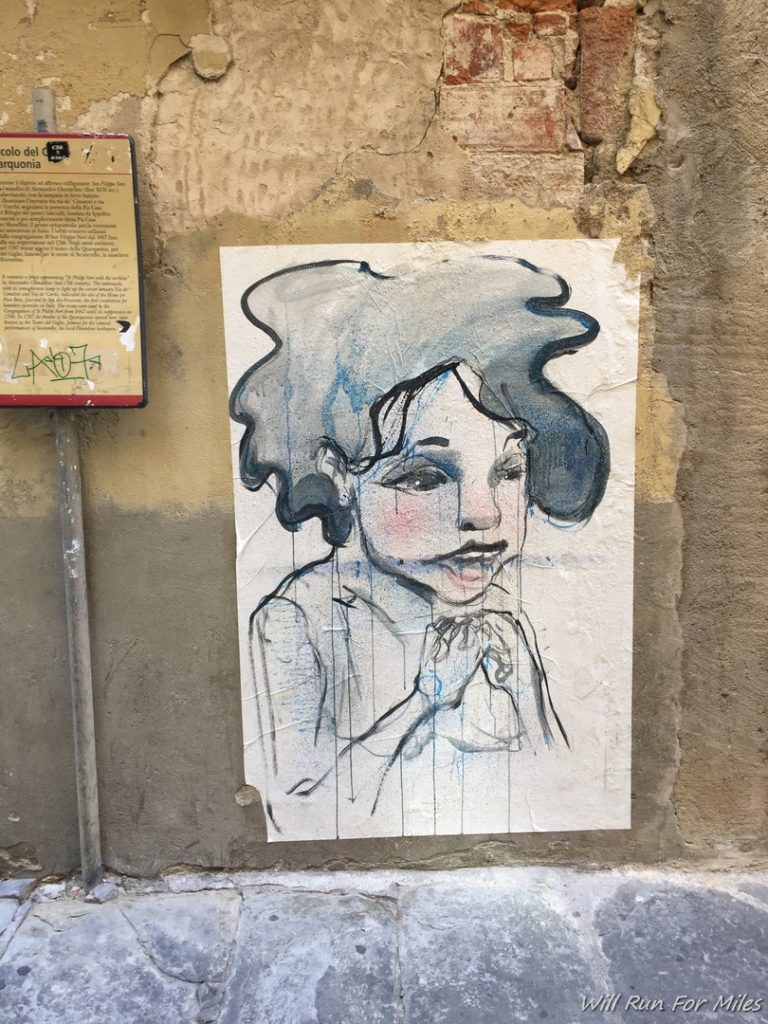a drawing of a woman on a wall