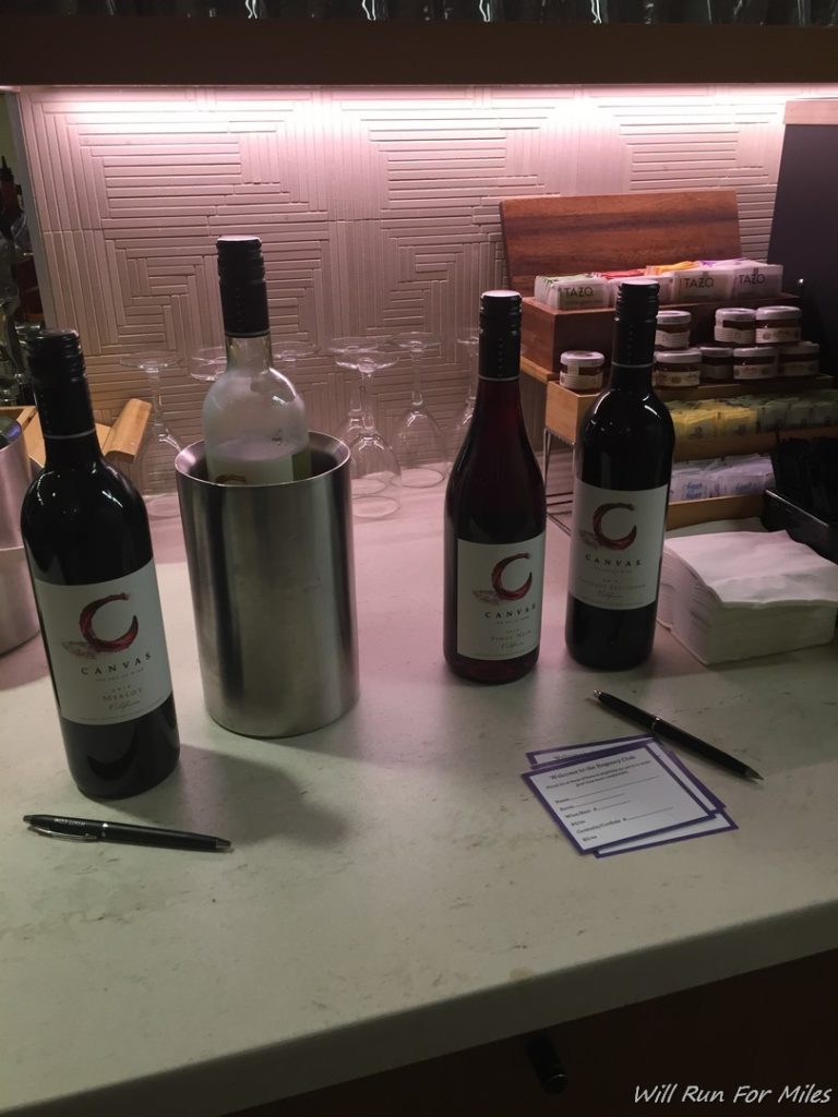 a group of bottles of wine on a table