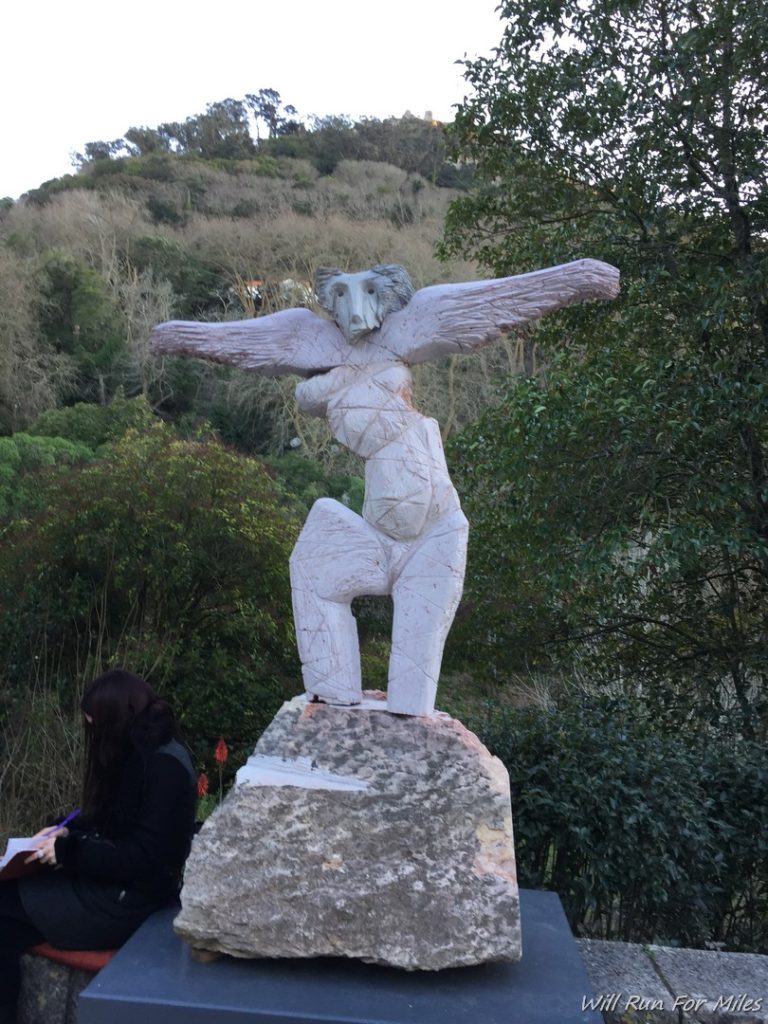 a statue of a woman with wings