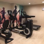 a room with treadmills and running machines