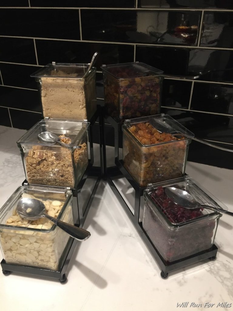 a group of containers with different foods