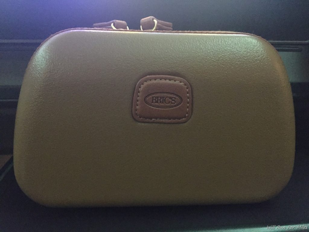 a brown leather case with a logo on it