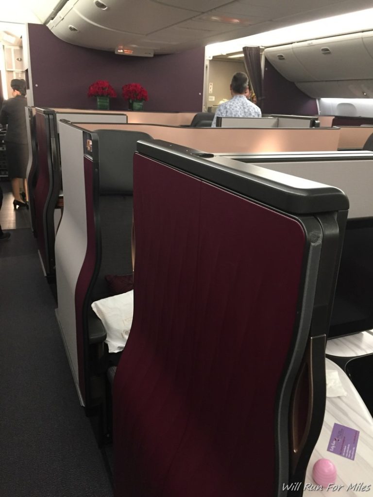 a group of chairs in an airplane