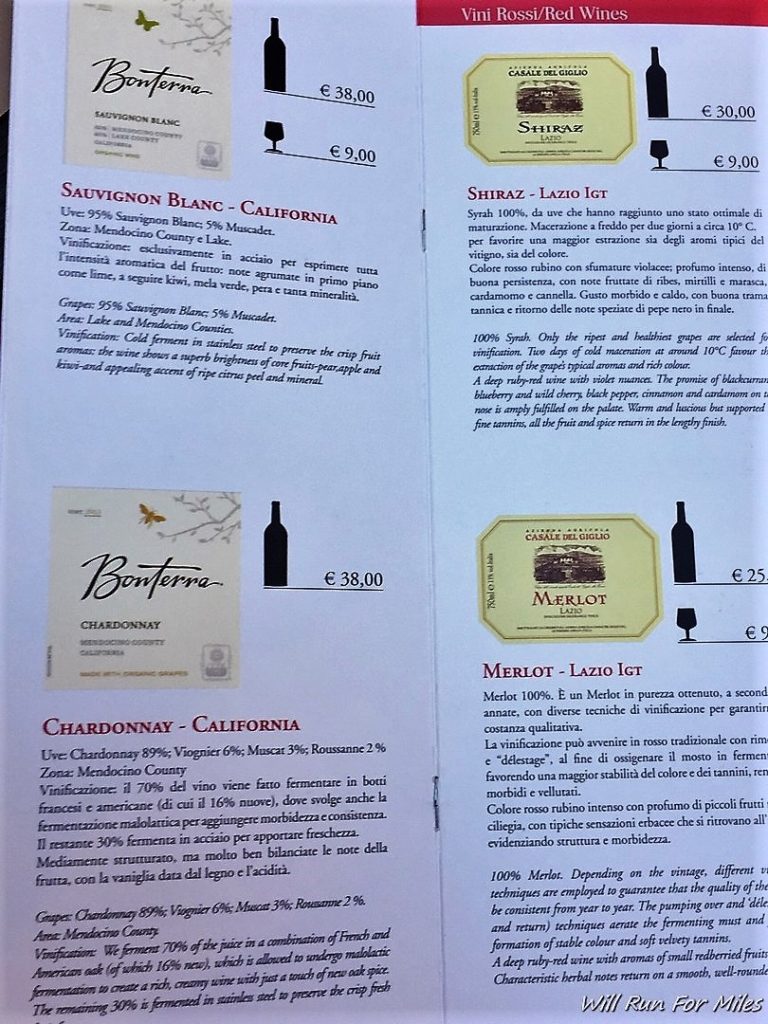 a menu with wine labels and price list