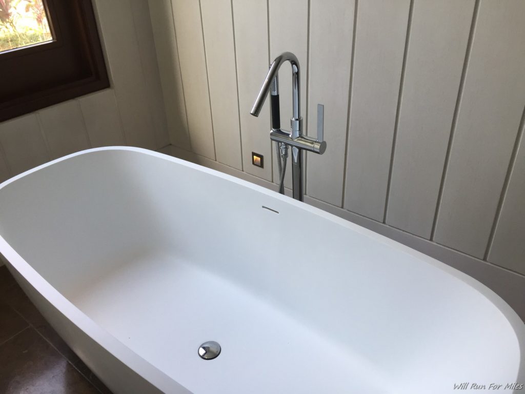 a bathtub with a faucet