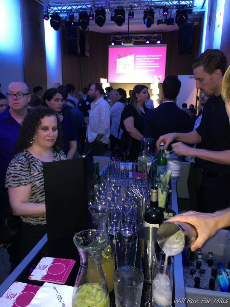 a group of people at a bar