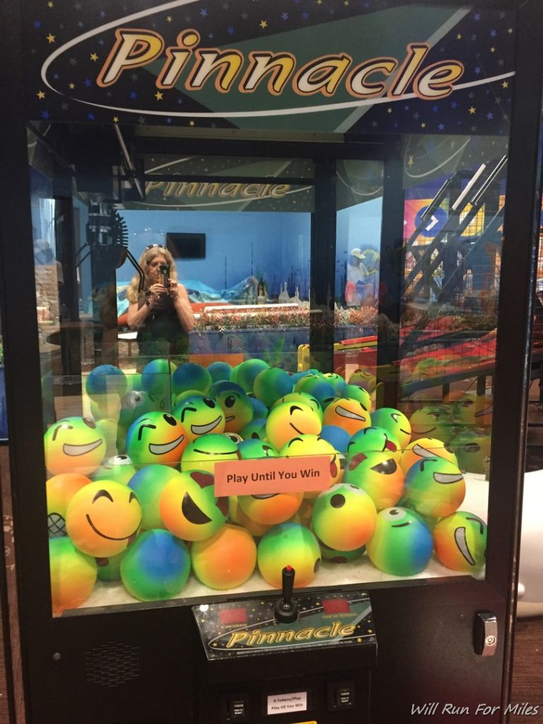 a machine with many smiley faces