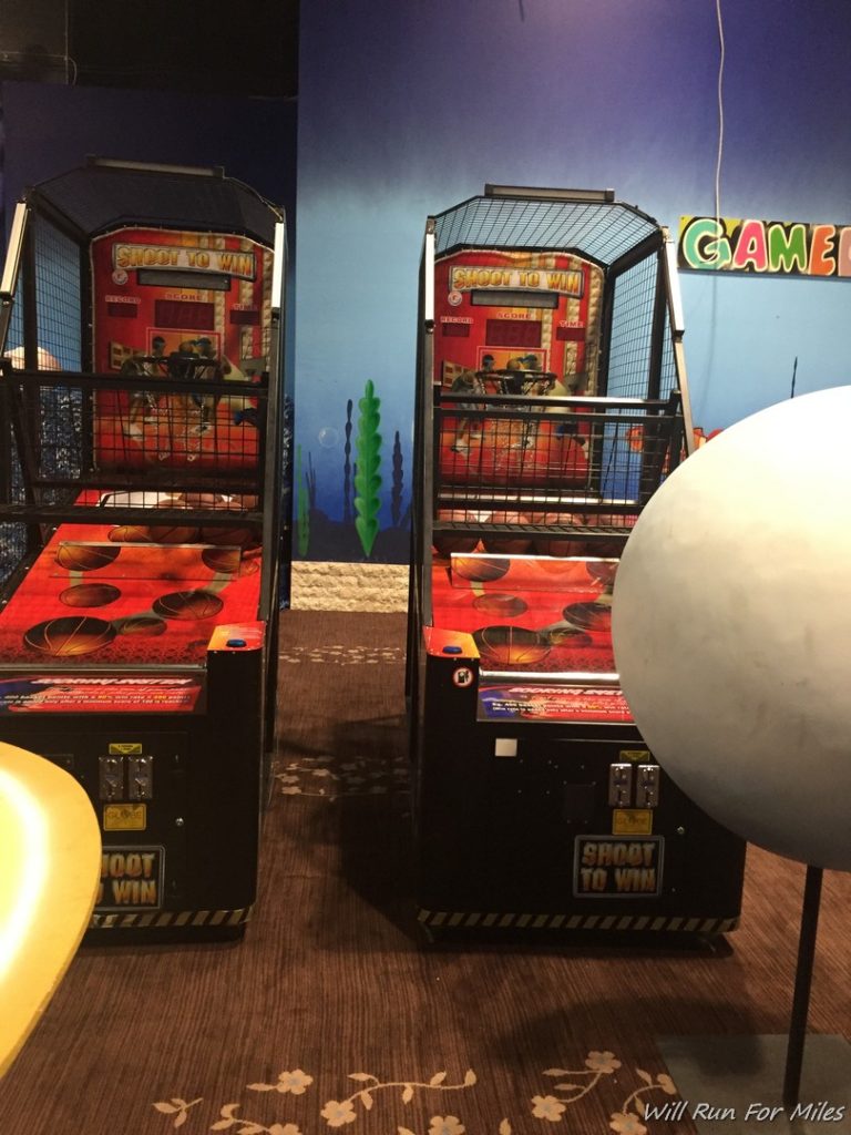 two arcade games in a room