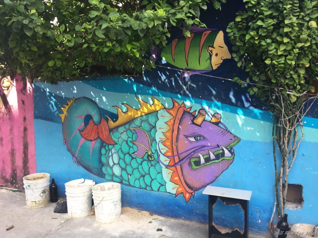 a wall with a fish painted on it