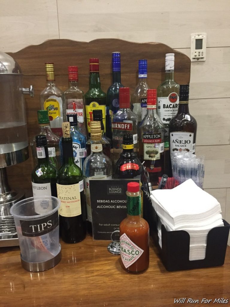 a group of bottles of alcohol on a table