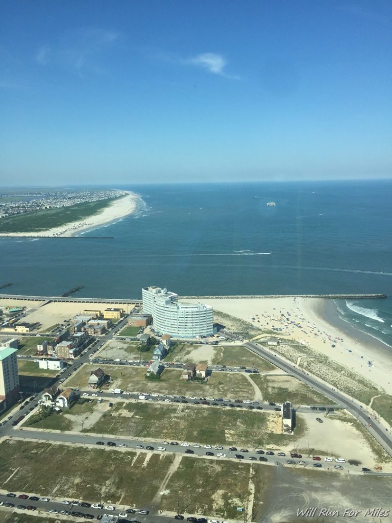 a aerial view of a beach and a city