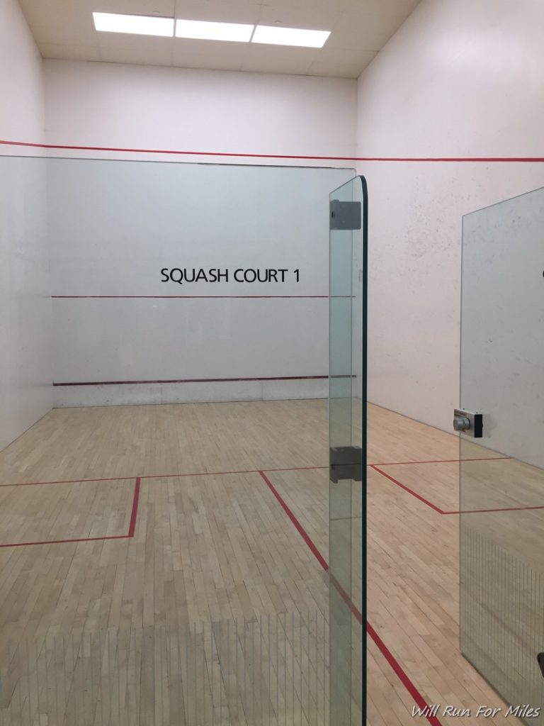 a squash court with red lines