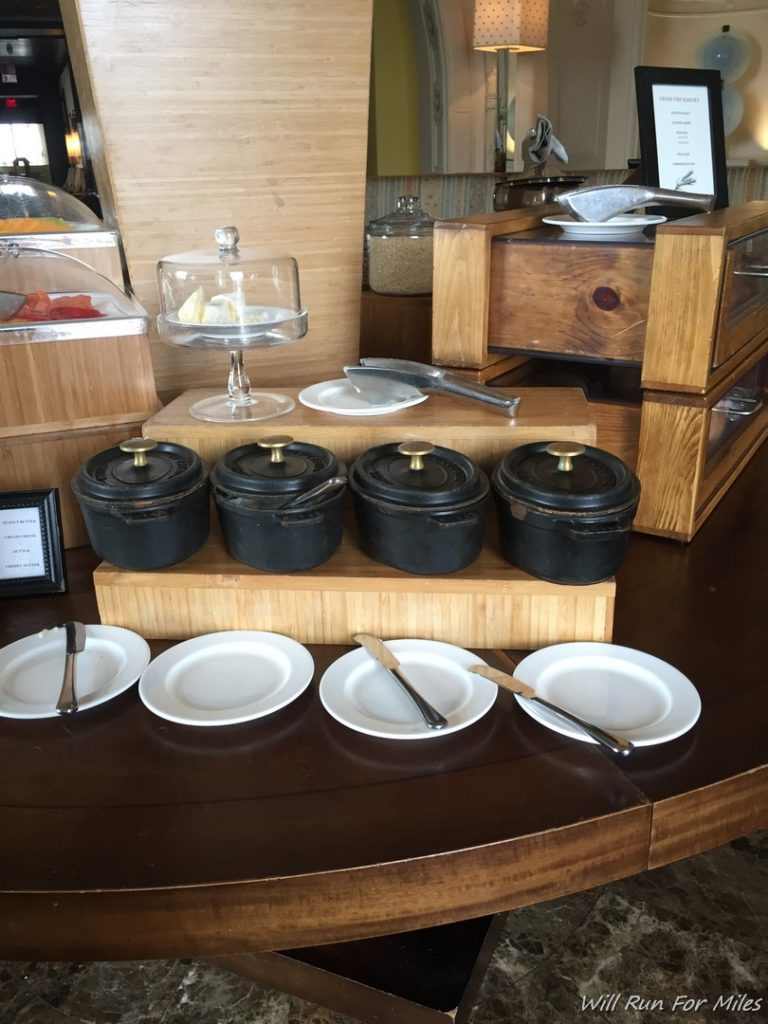 a table with plates and bowls on it