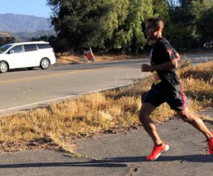 a man running on a road