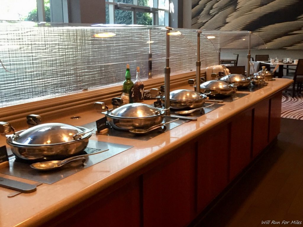 a row of pans on a counter