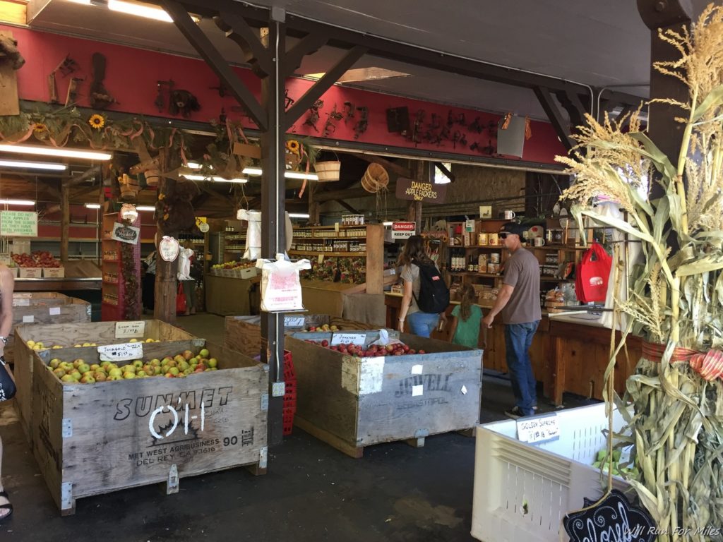 a store with fruit in crates