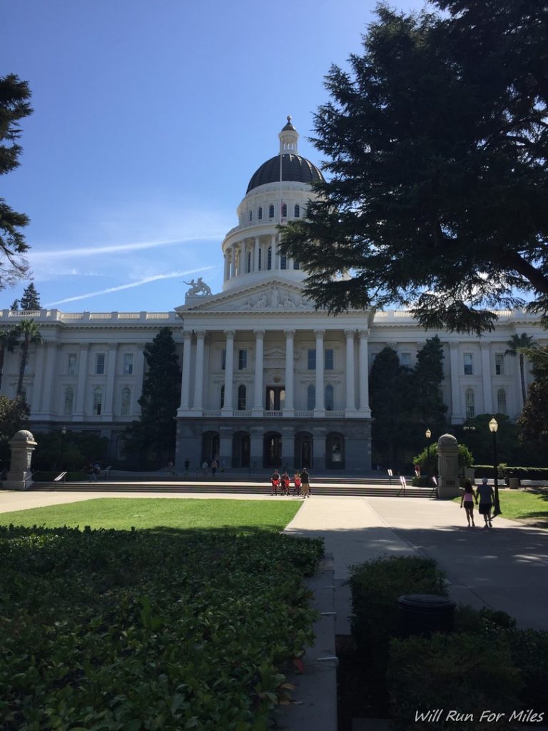 a large white building with a dome and columns