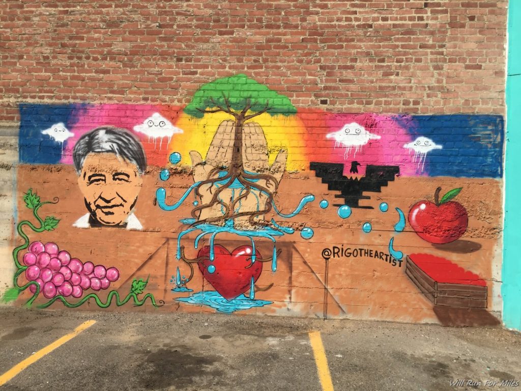 a mural on a brick wall