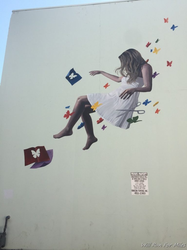 a mural of a woman in the air
