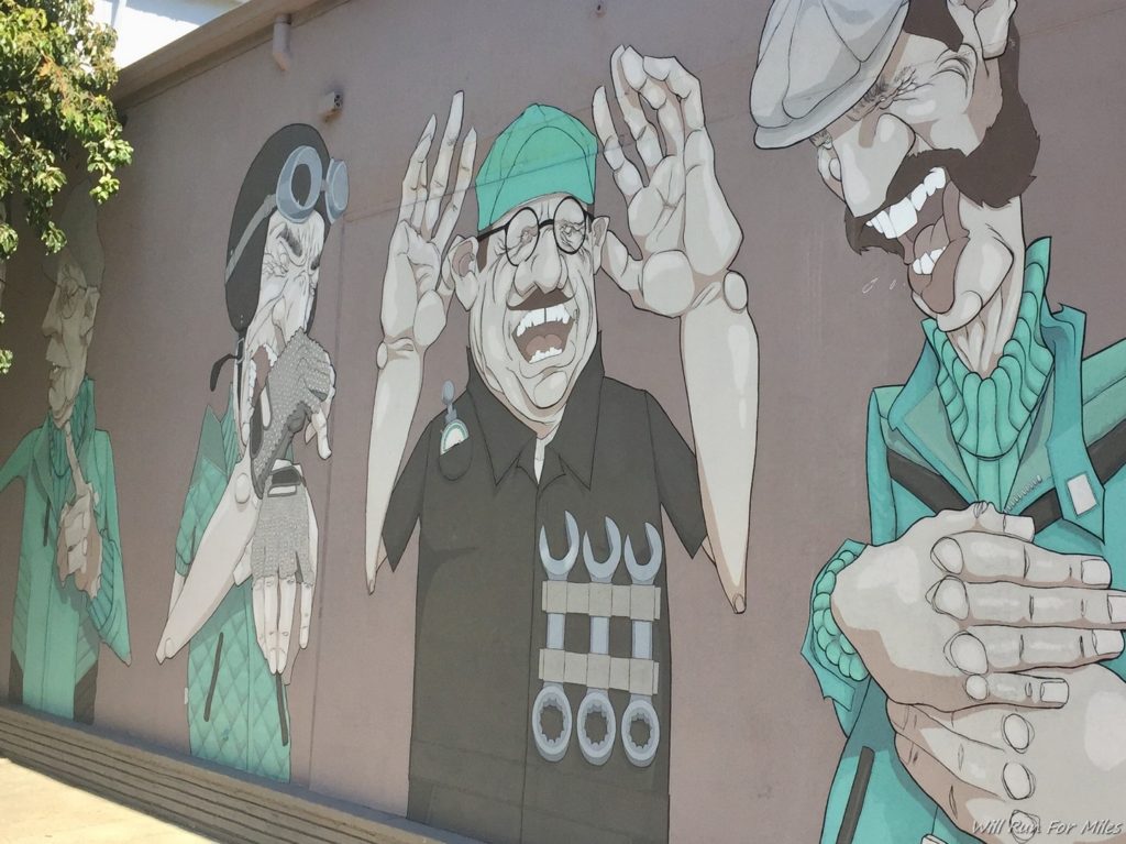 a mural of a group of men