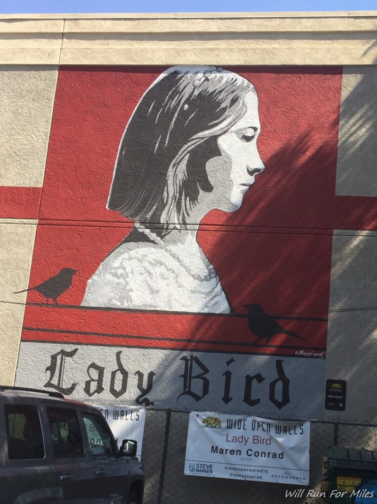 a mural of a woman on a building