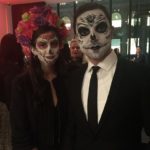 a man and woman with face paint