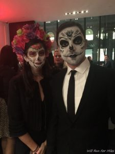 a man and woman with face paint